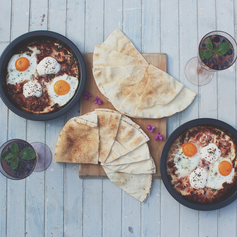 Homemade Charred Eggplant & Baby Octopus Shakshuka with Lebanese Bread; Blueberry & Passionfruit Cider