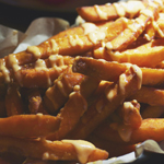 Belly Bao: Sweet Potato Fries drizzled with Chilli Aïoli