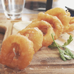 Meat District Co.: Crispy battered onion rings with truffle aioli